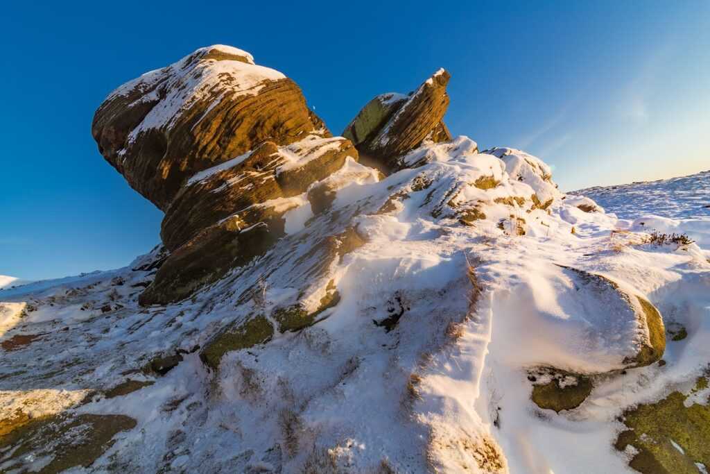 in rural areas, be aware of sudden hazards, particularly near _____.